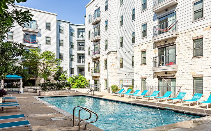 resort style pool grill area 3 axis west campus luxury off campus apartments near ut austin texas axis