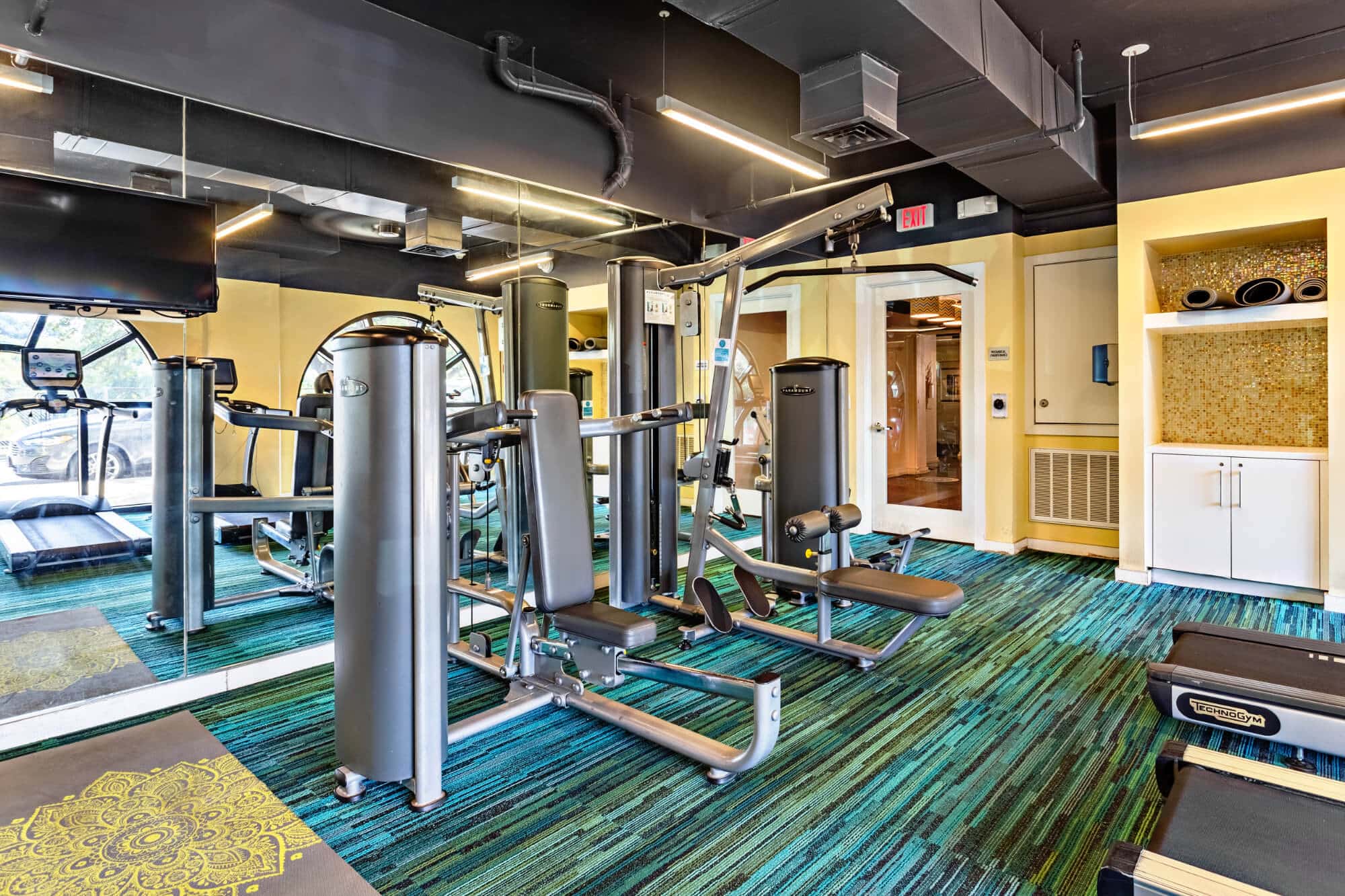 axis west campus off campus apartments in west campus near ut austin resident clubhouse fitness center machines